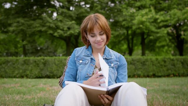 Student couple sitting in park, working on school project, tourette syndrome concept.