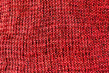 Jute fabric simple woven texture may used as background Christmas red decorative fabric