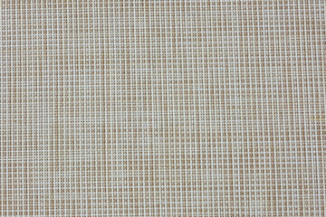 simple woven texture braided mat may used as background. woven strips brown background.  