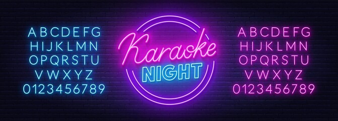 Karaoke night neon sign on brick wall background. © TanyaFox