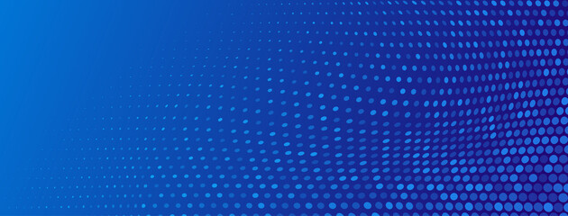 Abstract halftone background made of small round dots of different sizes in blue colors