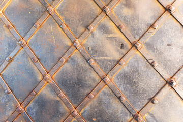 Rusty metal texture as background with streaks of rust