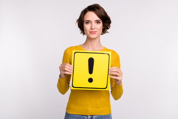 Photo of nice brunette millennial lady hold sign wear yellow shirt isolated on grey color background