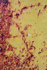 Old yellow rusty metal and scratch
background.