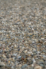 Pebble beach stone coastline close up view