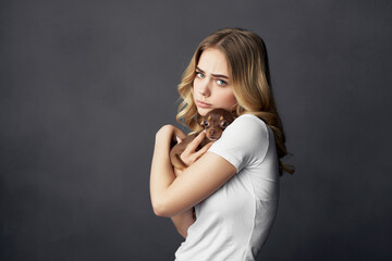 Fototapeta premium pretty woman pedigree dog fashion Lifestyle dark background