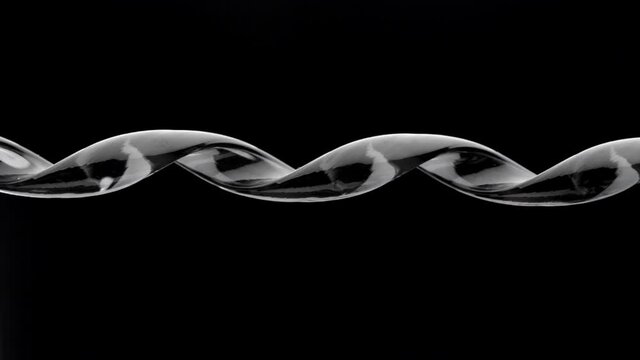 Spring is compressed and expanded against a black background.
