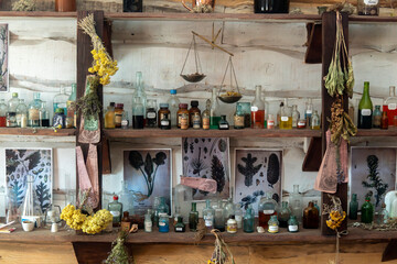 shelves of bottles with ancient medicines of the ancient pharmacist.