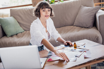 Photo of nice brunette young lady do art wear white shirt sit at home alone