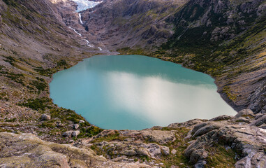 Trift glacial mountain lake in the Bernese Swiss Alps. Summer, daytime, no people