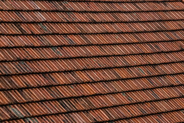 roof tile. tile roof of a old house. tile roofs used in old and modern style construction for safety and also it keeps house cool inside