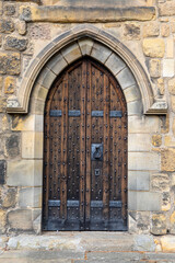 Fototapeta na wymiar Doorway at Hexham Abbey in Northumberland, UK