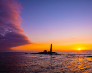 Sunrise at St. Marys Lighthouse in Northumberland, UK