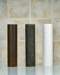 Closeup comparison old dirty water filters with the new one 10 inch. Dirty reverse osmosis filters with the new one after 1 year usage.