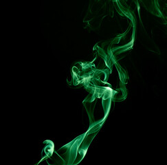 Obraz premium green smoke on black background