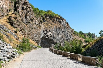 Fototapeta na wymiar Picturesque road and rocks in the mountains of Armenia.