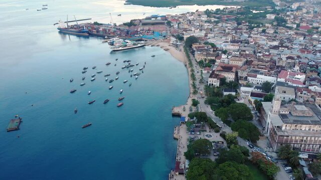 dhow boats and stone town city at unguja zanzibar island in tanzania indian ocean aerial view