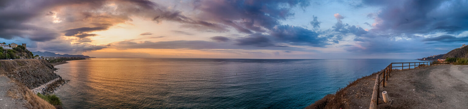Sunset over Adriatic Sea with golden dramatic sky panorama. Solaris