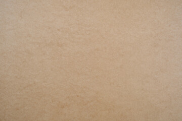 Fiberboard (MDF) surface. Recycled wood texture. Wooden surface of a fibreboard d sheet, top view. Brown hardboard texture background.
