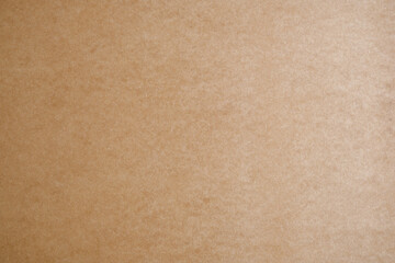 Fiberboard (MDF) surface. Recycled wood texture. Wooden surface of a fibreboard d sheet, top view. Brown hardboard texture background.