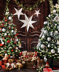 Christmas background with two Christmas trees and presents in rustic style interior