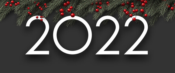 2022 Christmas fir branches with red berries.