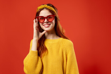 woman with yellow headband red glasses fashion yellow sweater