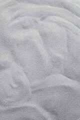 Fototapeta na wymiar Texture of gray sand. 