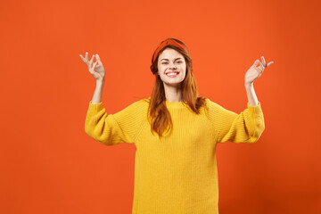 cheerful woman in yellow sweater studio fashion decoration