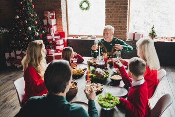 Photo of family small childhood grandchildren pensioner retired grandparents friends couple noel sit table harmony x-mas indoors