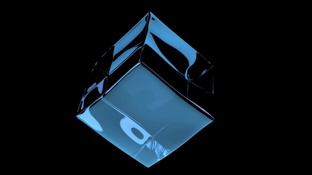 glass cube rotates on black background 