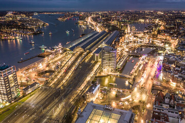 Amsterdam Centraal Train Station at Night Aerial View
