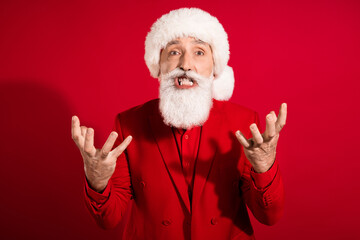 Photo of angry aggressive santa claus have employment conflict wear x-mas hat suit on red color...