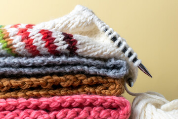 a pile of knitted wool hats 