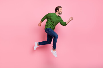 Fototapeta na wymiar Full size profile portrait of carefree cheerful person look copyspace rush isolated on pink color background