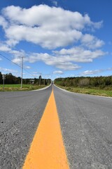 The road under a blue sky, Saint-Paul, Québec, Canada