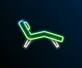 Glowing neon line Armchair icon isolated on black background. Colorful outline concept. Vector