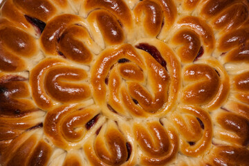 Fragment of a pie with fruit filling. Close-up of a pie with fruit filling. Homemade baking
