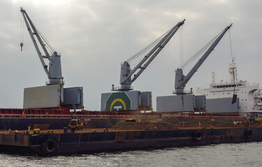 Fototapeta na wymiar DIONYSUS Bulk Carrier ship during transshipment operation, on Guanabara bay, Rio de Janeiro
