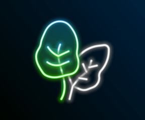Glowing neon line Tropical leaves of palm tree icon isolated on black background. Colorful outline concept. Vector