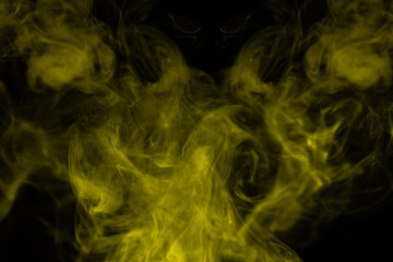Yellow steam on a black background.