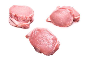 Raw pork pieces isolated on a white background.