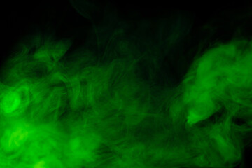 Fototapeta na wymiar Green steam on a black background.