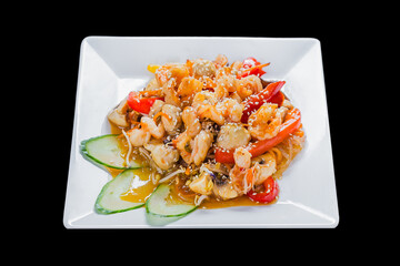 vietnamese cuisine, udon wok with seafood, on a black isolated background, top