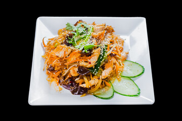 vietnamese cuisine, udon wok with seafood, on a black isolated background, top