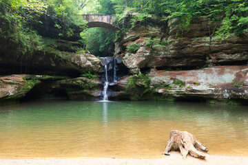 Flowing waterfall in the forest at Hocking Hills State Park in Ohio