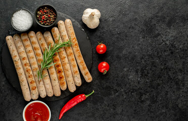 grilled bavarian sausages on a stone background  with copy space for your text