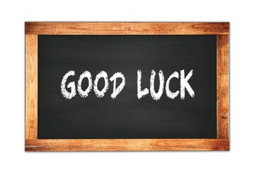 Obraz premium GOOD LUCK text written on wooden frame school blackboard.