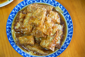 A delicious Chinese dish, meat rolls wrapped in yuba skin