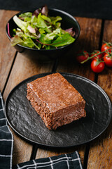 Raw vegetable vegan minced meat pate on wooden table. Copy space